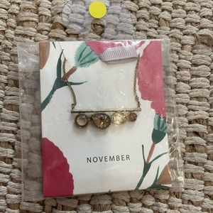 Gold necklace with stones